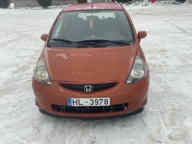 Красный Хонда Джаз, объемом двигателя 1.4 л и пробегом 325 тыс. км за 1700 $, фото 1 на Automoto.ua