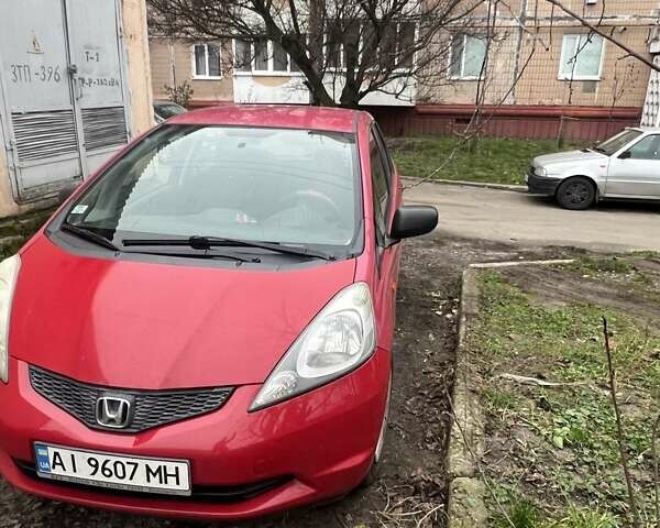 Красный Хонда Джаз, объемом двигателя 1.2 л и пробегом 218 тыс. км за 4500 $, фото 1 на Automoto.ua