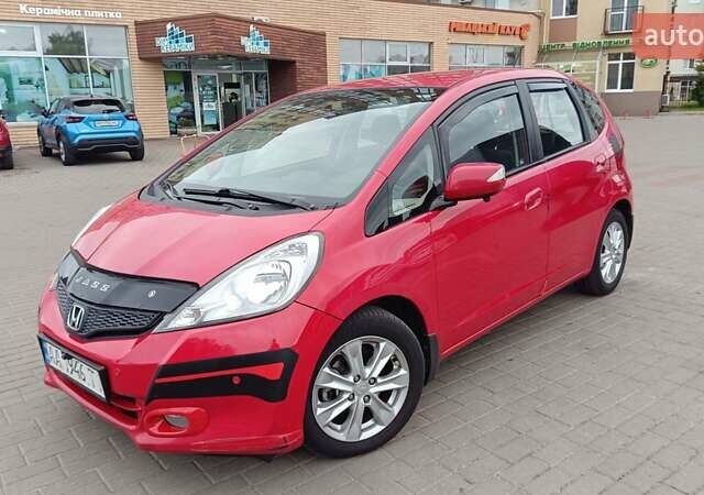 Красный Хонда Джаз, объемом двигателя 1.3 л и пробегом 154 тыс. км за 7300 $, фото 1 на Automoto.ua