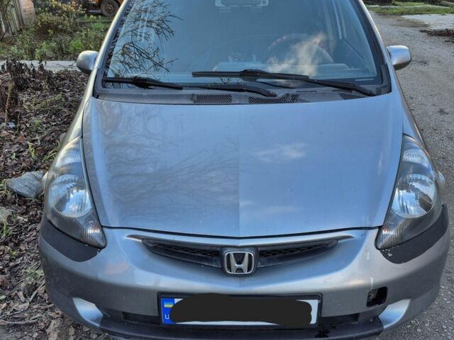Серый Хонда Джаз, объемом двигателя 1.4 л и пробегом 208 тыс. км за 4500 $, фото 1 на Automoto.ua