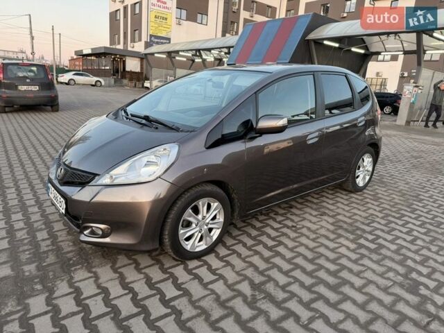 Серый Хонда Джаз, объемом двигателя 1.34 л и пробегом 150 тыс. км за 7900 $, фото 1 на Automoto.ua