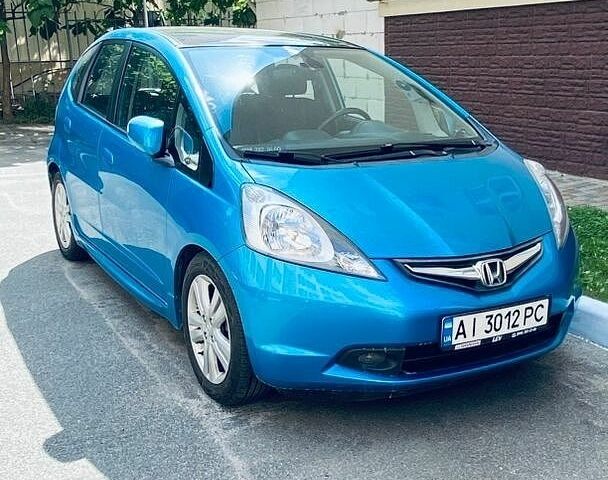 Синий Хонда Джаз, объемом двигателя 1.34 л и пробегом 250 тыс. км за 8999 $, фото 1 на Automoto.ua