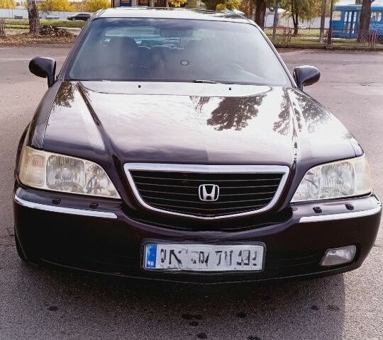 Черный Хонда Легенд, объемом двигателя 3.5 л и пробегом 320 тыс. км за 3500 $, фото 1 на Automoto.ua