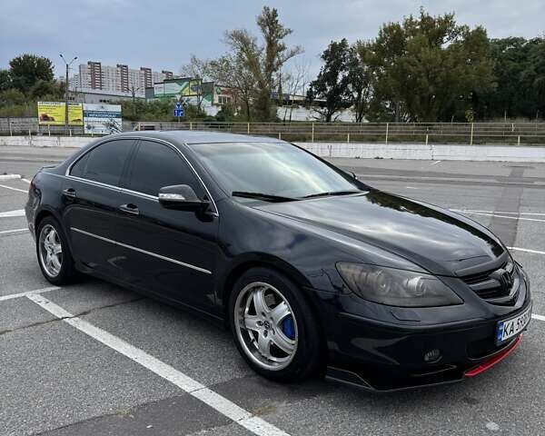 Черный Хонда Легенд, объемом двигателя 3.47 л и пробегом 301 тыс. км за 6500 $, фото 1 на Automoto.ua