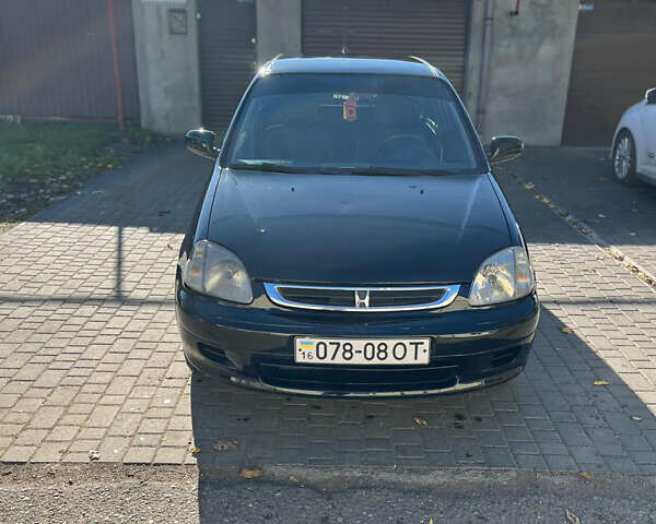 Черный Хонда Лого, объемом двигателя 1.4 л и пробегом 200 тыс. км за 2600 $, фото 1 на Automoto.ua