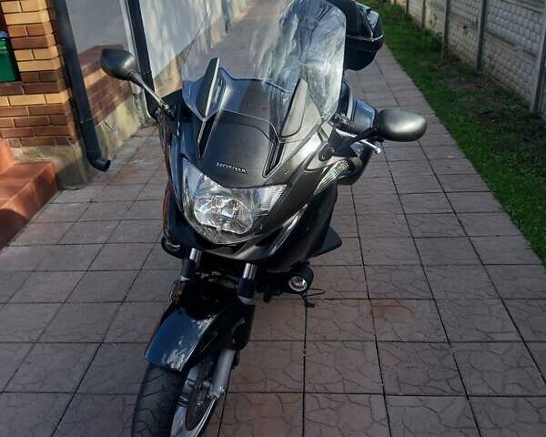 Черный Хонда NT 700V, объемом двигателя 0.68 л и пробегом 29 тыс. км за 5400 $, фото 1 на Automoto.ua
