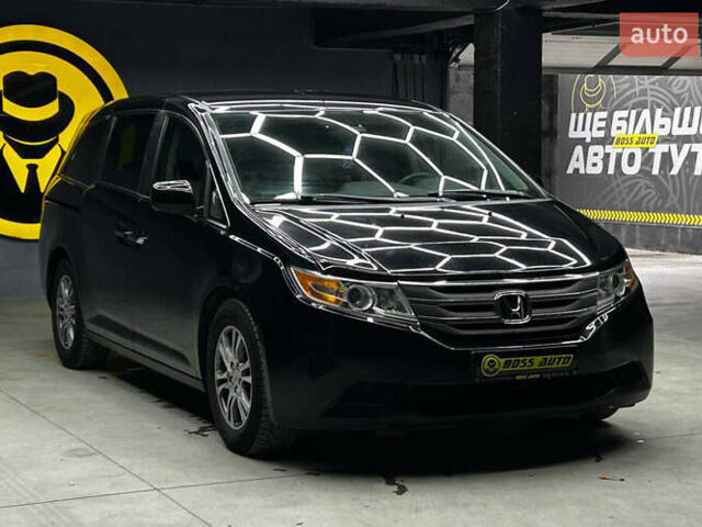 Черный Хонда Одиссей, объемом двигателя 3.47 л и пробегом 314 тыс. км за 12000 $, фото 1 на Automoto.ua