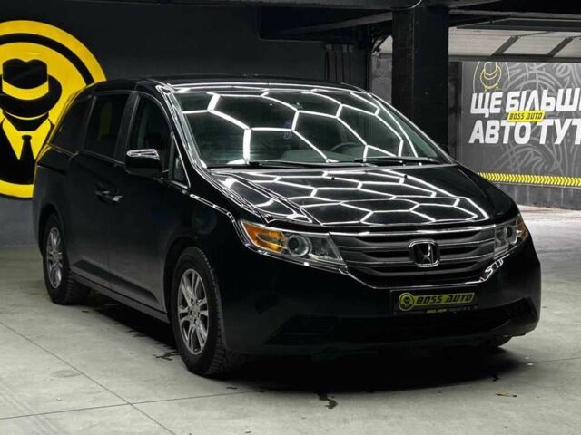 Черный Хонда Одиссей, объемом двигателя 3.5 л и пробегом 314 тыс. км за 12000 $, фото 1 на Automoto.ua