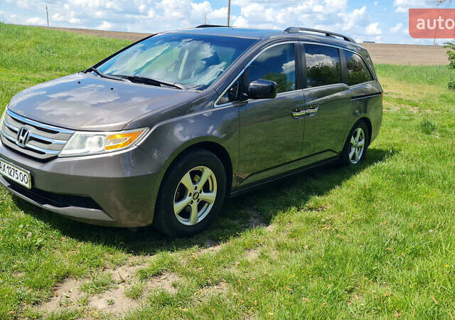 Серый Хонда Одиссей, объемом двигателя 3.47 л и пробегом 301 тыс. км за 11850 $, фото 1 на Automoto.ua