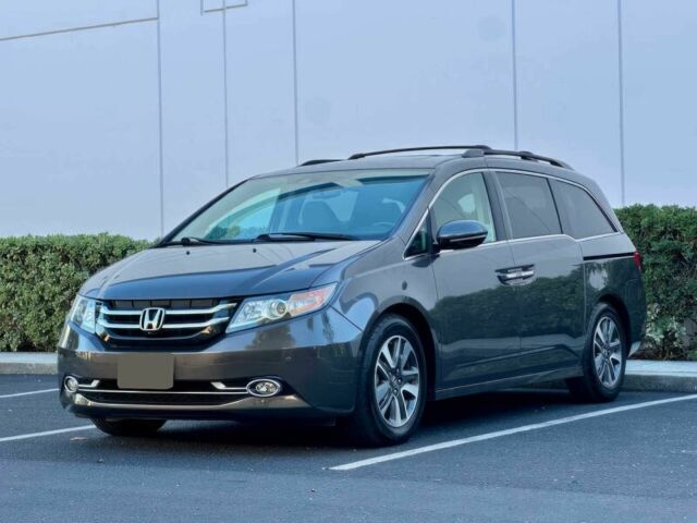Серый Хонда Одиссей, объемом двигателя 3.5 л и пробегом 80 тыс. км за 14500 $, фото 1 на Automoto.ua