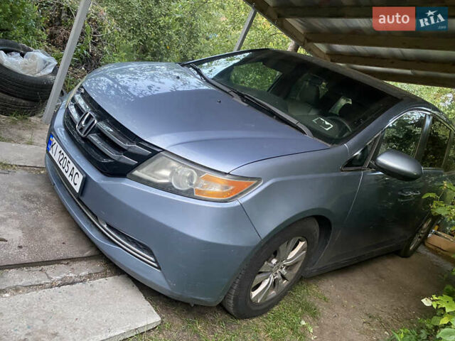 Синий Хонда Одиссей, объемом двигателя 3.47 л и пробегом 335 тыс. км за 15700 $, фото 1 на Automoto.ua