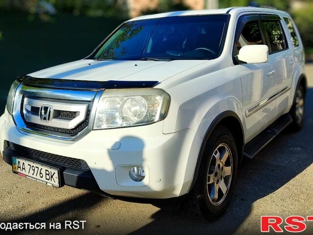 Білий Хонда Пілот, об'ємом двигуна 3.5 л та пробігом 200 тис. км за 14000 $, фото 1 на Automoto.ua