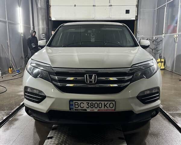 Белый Хонда Пилот, объемом двигателя 3.47 л и пробегом 145 тыс. км за 23500 $, фото 1 на Automoto.ua