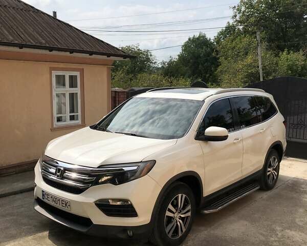 Белый Хонда Пилот, объемом двигателя 3.47 л и пробегом 72 тыс. км за 28000 $, фото 1 на Automoto.ua