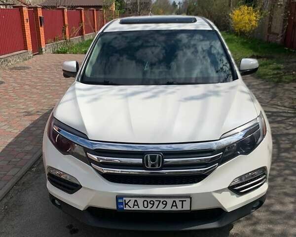 Белый Хонда Пилот, объемом двигателя 3.47 л и пробегом 106 тыс. км за 21000 $, фото 1 на Automoto.ua