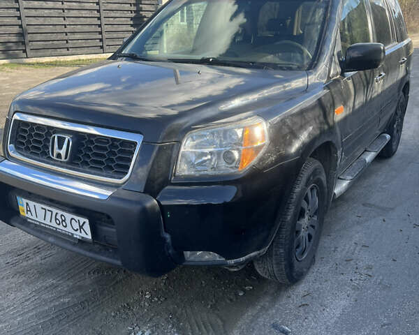 Чорний Хонда Пілот, об'ємом двигуна 3.5 л та пробігом 211 тис. км за 8000 $, фото 1 на Automoto.ua