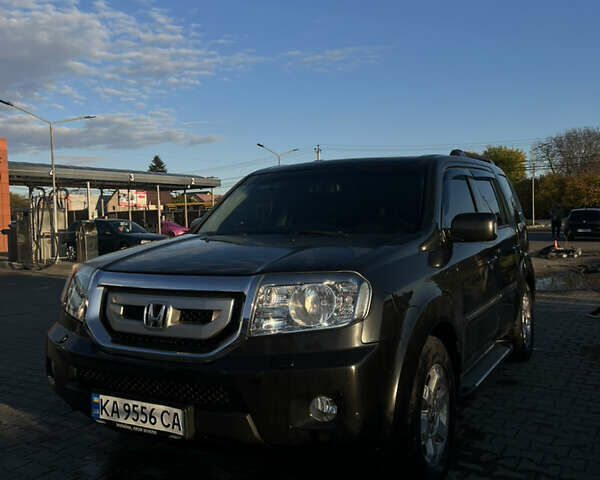 Черный Хонда Пилот, объемом двигателя 3.47 л и пробегом 251 тыс. км за 10500 $, фото 1 на Automoto.ua