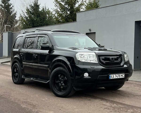 Чорний Хонда Пілот, об'ємом двигуна 3.5 л та пробігом 345 тис. км за 14000 $, фото 1 на Automoto.ua