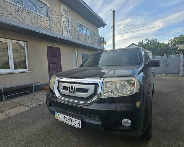 Чорний Хонда Пілот, об'ємом двигуна 3.5 л та пробігом 187 тис. км за 9800 $, фото 1 на Automoto.ua