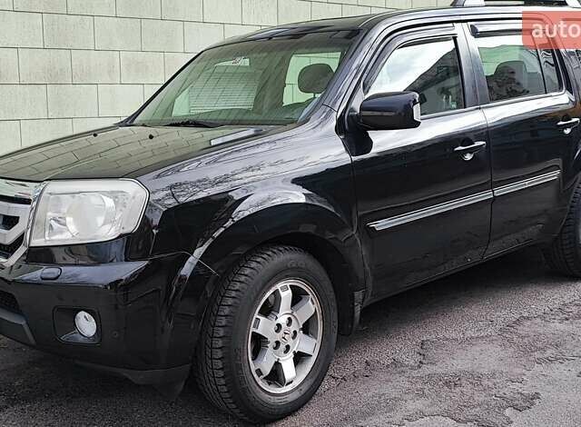 Черный Хонда Пилот, объемом двигателя 3.5 л и пробегом 244 тыс. км за 9200 $, фото 1 на Automoto.ua