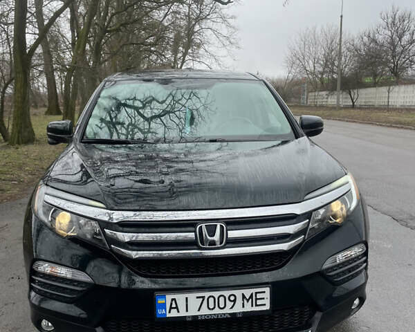 Черный Хонда Пилот, объемом двигателя 3.5 л и пробегом 108 тыс. км за 20000 $, фото 1 на Automoto.ua