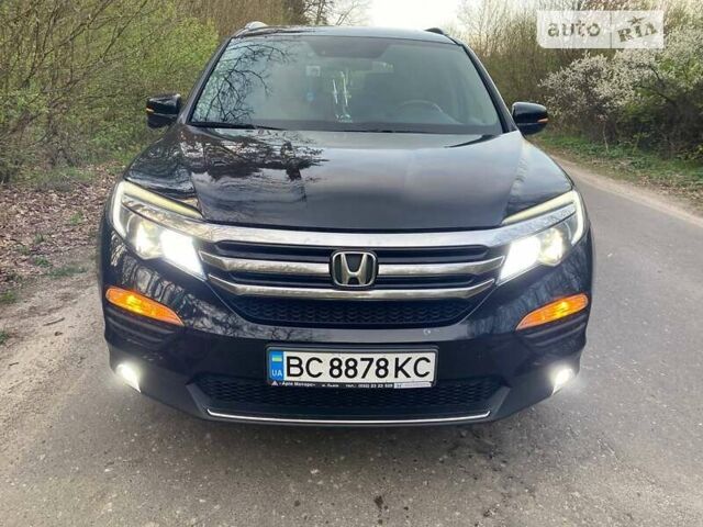 Черный Хонда Пилот, объемом двигателя 3 л и пробегом 235 тыс. км за 25500 $, фото 1 на Automoto.ua