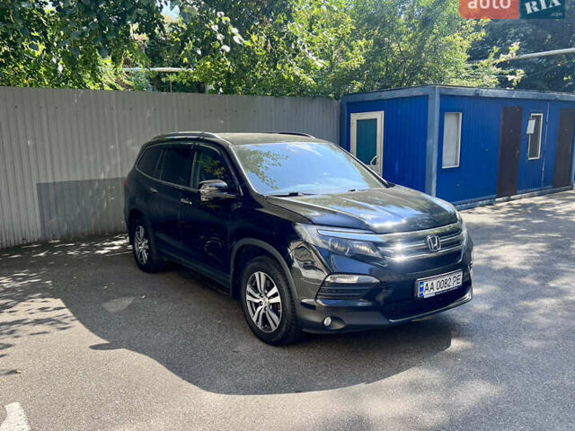 Черный Хонда Пилот, объемом двигателя 3 л и пробегом 192 тыс. км за 23499 $, фото 1 на Automoto.ua
