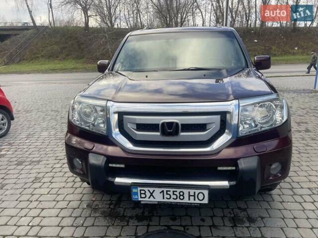 Червоний Хонда Пілот, об'ємом двигуна 3.47 л та пробігом 350 тис. км за 11500 $, фото 1 на Automoto.ua