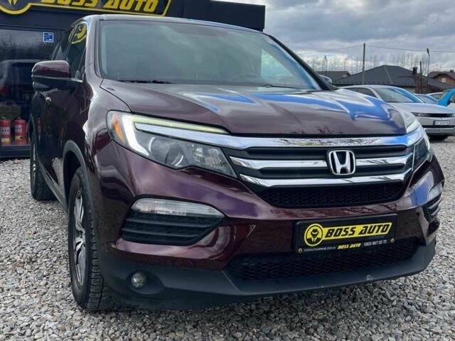 Красный Хонда Пилот, объемом двигателя 3.5 л и пробегом 246 тыс. км за 17300 $, фото 1 на Automoto.ua