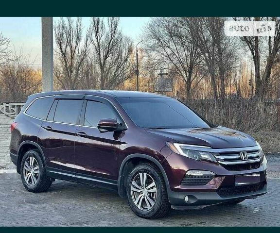 Красный Хонда Пилот, объемом двигателя 0 л и пробегом 180 тыс. км за 23400 $, фото 1 на Automoto.ua