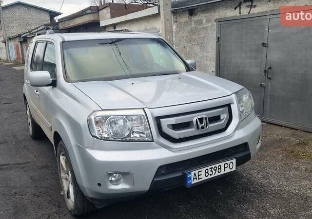 Серый Хонда Пилот, объемом двигателя 3.5 л и пробегом 250 тыс. км за 12000 $, фото 1 на Automoto.ua