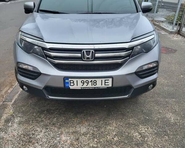 Сірий Хонда Пілот, об'ємом двигуна 3 л та пробігом 145 тис. км за 28999 $, фото 1 на Automoto.ua
