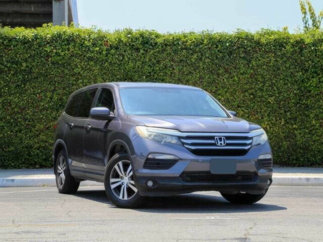Серый Хонда Пилот, объемом двигателя 3.5 л и пробегом 68 тыс. км за 18500 $, фото 1 на Automoto.ua
