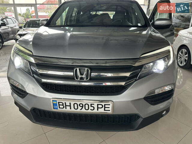 Серый Хонда Пилот, объемом двигателя 3.47 л и пробегом 77 тыс. км за 24950 $, фото 1 на Automoto.ua