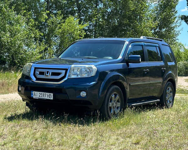 Синій Хонда Пілот, об'ємом двигуна 3.5 л та пробігом 210 тис. км за 8999 $, фото 1 на Automoto.ua