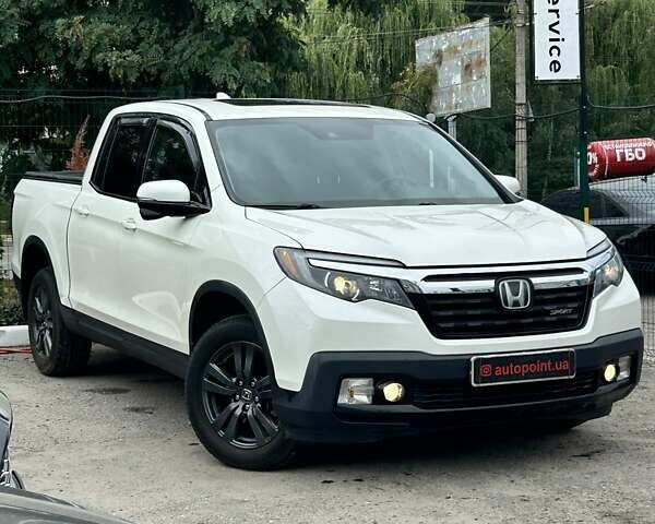 Білий Хонда Ріджлайн, об'ємом двигуна 3.5 л та пробігом 87 тис. км за 23900 $, фото 1 на Automoto.ua