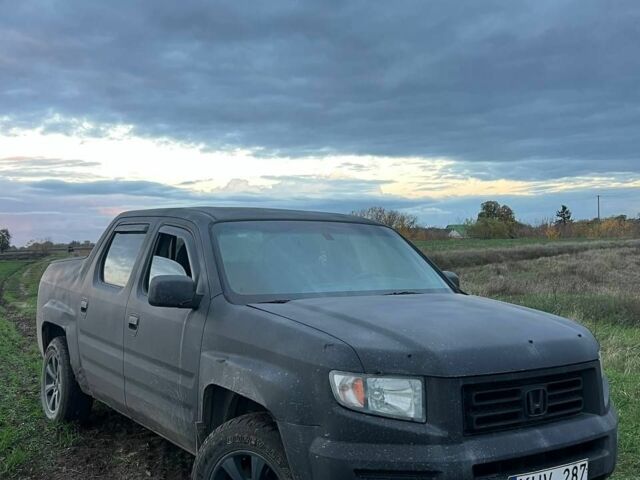 Чорний Хонда Ріджлайн, об'ємом двигуна 3.5 л та пробігом 300 тис. км за 3504 $, фото 1 на Automoto.ua