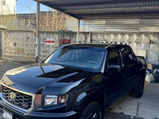 Черный Хонда Риджлайн, объемом двигателя 3.5 л и пробегом 303 тыс. км за 13500 $, фото 1 на Automoto.ua