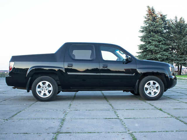 Черный Хонда Риджлайн, объемом двигателя 3.5 л и пробегом 130 тыс. км за 13500 $, фото 1 на Automoto.ua