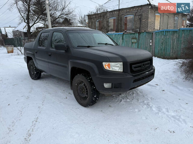 Черный Хонда Риджлайн, объемом двигателя 3.5 л и пробегом 260 тыс. км за 4700 $, фото 1 на Automoto.ua