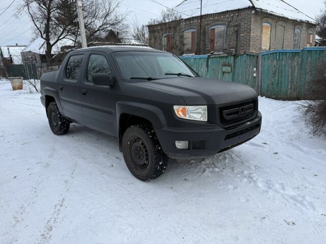 Черный Хонда Риджлайн, объемом двигателя 3.5 л и пробегом 260 тыс. км за 4700 $, фото 1 на Automoto.ua