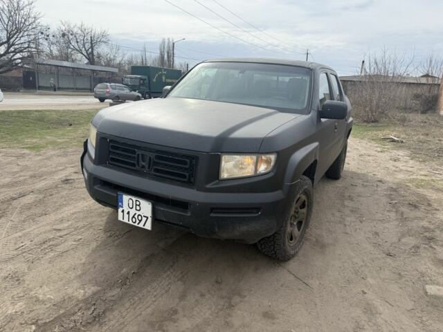 Черный Хонда Риджлайн, объемом двигателя 3.5 л и пробегом 200 тыс. км за 7500 $, фото 1 на Automoto.ua