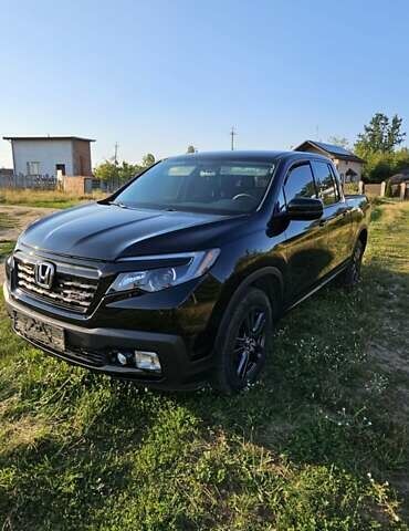 Чорний Хонда Ріджлайн, об'ємом двигуна 3.5 л та пробігом 160 тис. км за 23000 $, фото 1 на Automoto.ua