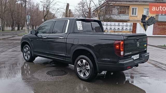 Чорний Хонда Ріджлайн, об'ємом двигуна 3.5 л та пробігом 68 тис. км за 26500 $, фото 1 на Automoto.ua