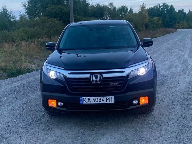 Чорний Хонда Ріджлайн, об'ємом двигуна 3.5 л та пробігом 64 тис. км за 25000 $, фото 1 на Automoto.ua