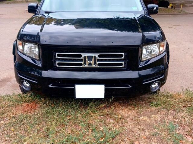 Чорний Хонда Ріджлайн, об'ємом двигуна 3.5 л та пробігом 270 тис. км за 4710 $, фото 1 на Automoto.ua