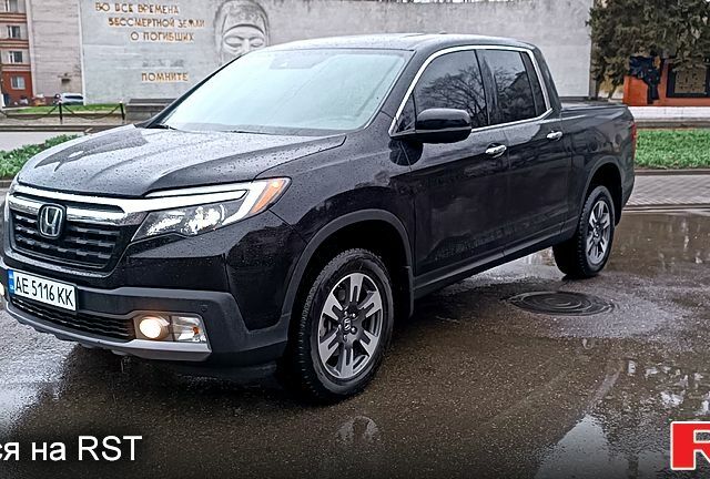 Чорний Хонда Ріджлайн, об'ємом двигуна 3.5 л та пробігом 67 тис. км за 26000 $, фото 1 на Automoto.ua