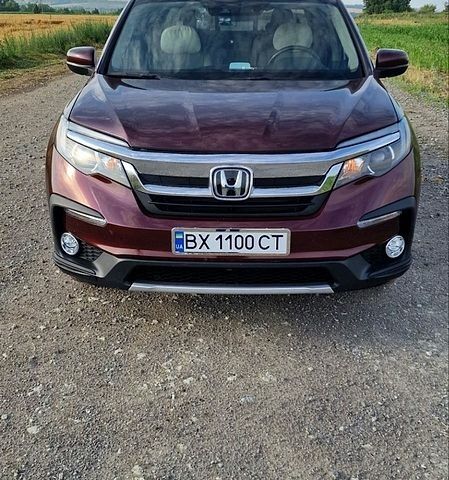 Красный Хонда Риджлайн, объемом двигателя 3.5 л и пробегом 98 тыс. км за 26500 $, фото 1 на Automoto.ua