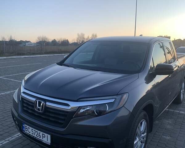 Сірий Хонда Ріджлайн, об'ємом двигуна 3.5 л та пробігом 141 тис. км за 28000 $, фото 1 на Automoto.ua