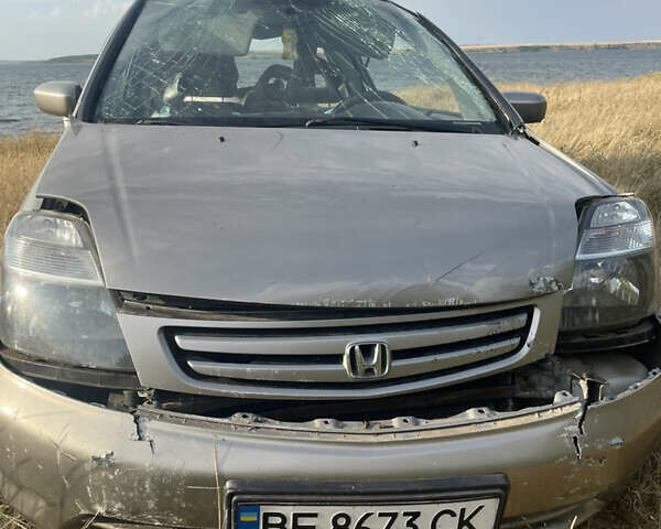 Бежевый Хонда Стрим, объемом двигателя 2 л и пробегом 380 тыс. км за 1100 $, фото 1 на Automoto.ua
